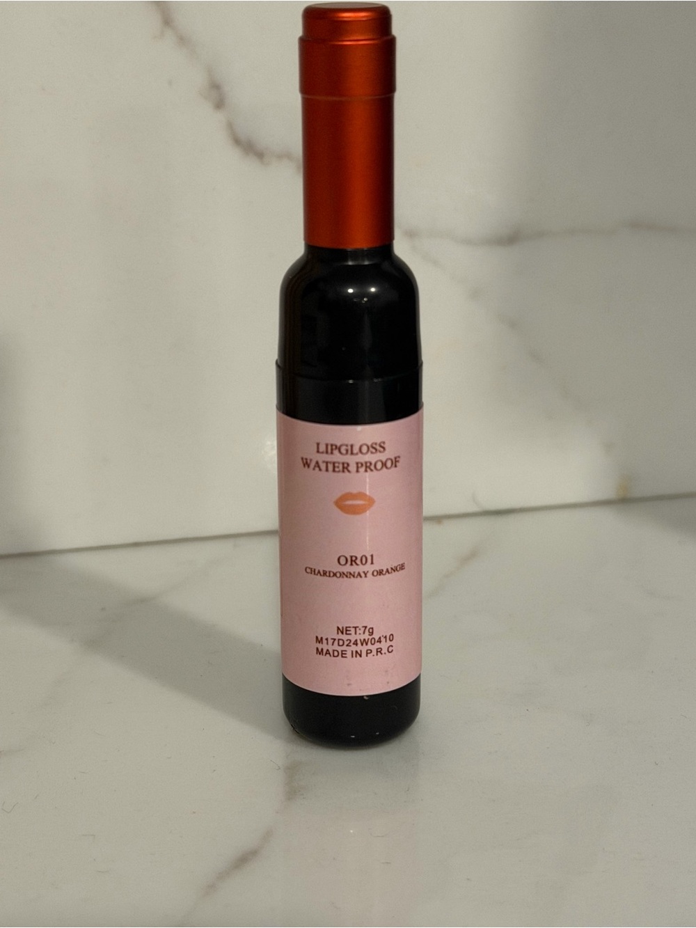 Waterproof Lipgloss in Chardonnay Orange